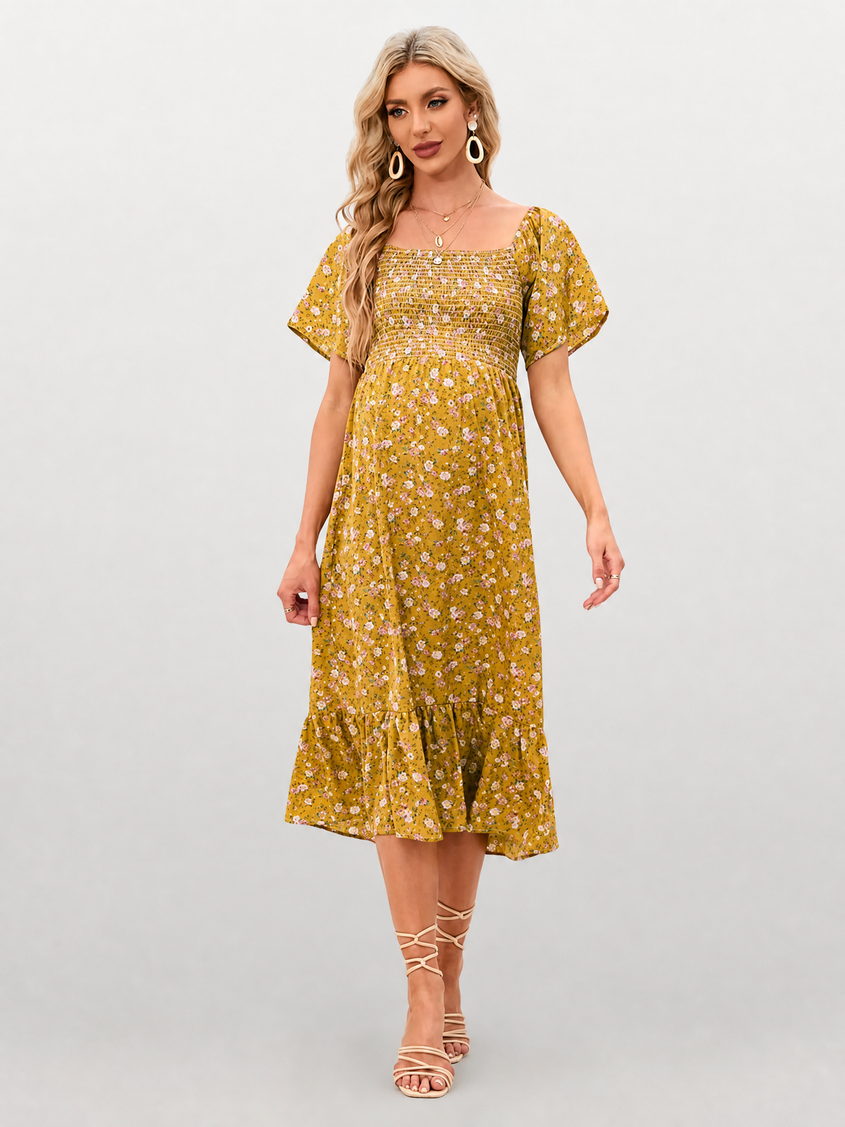 Midikleid für die Schwangerschaft mit Blumenmuster und Smok-Oberteil